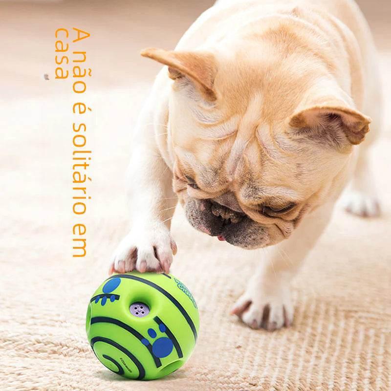 French bulldog playing with green interactive dog toy on carpet