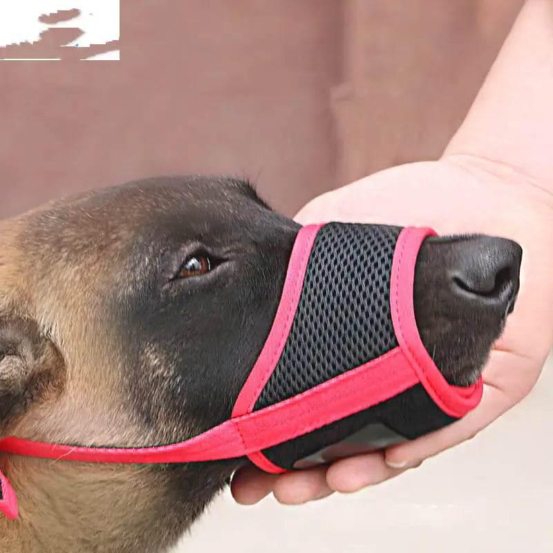 Black and pink mesh dog muzzle for safe pet handling and training