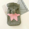 Knitted pet sweater with pink star and pom-pom, cozy dog or cat clothing