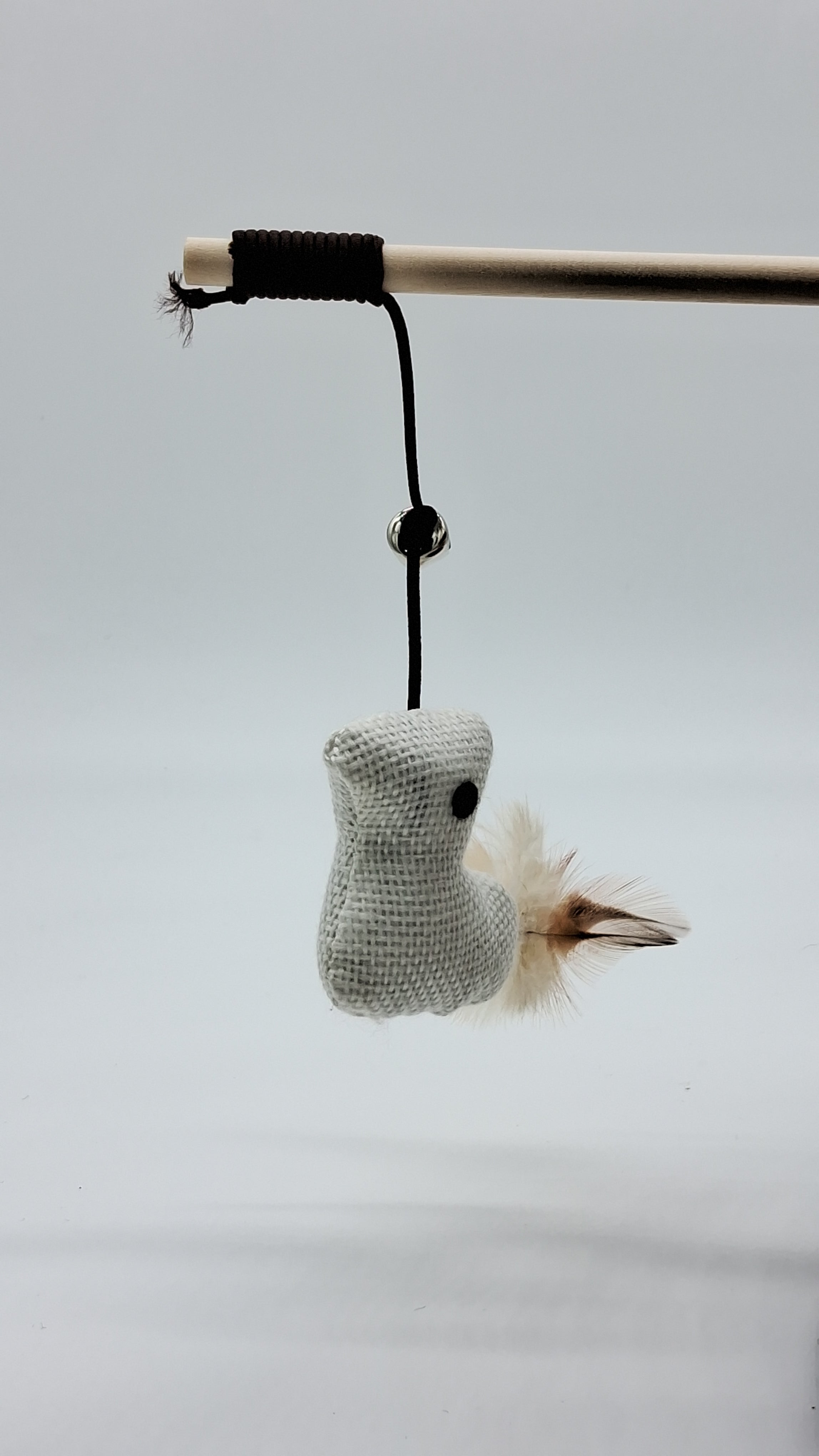 Cat wand toy with feather and burlap mouse for interactive play