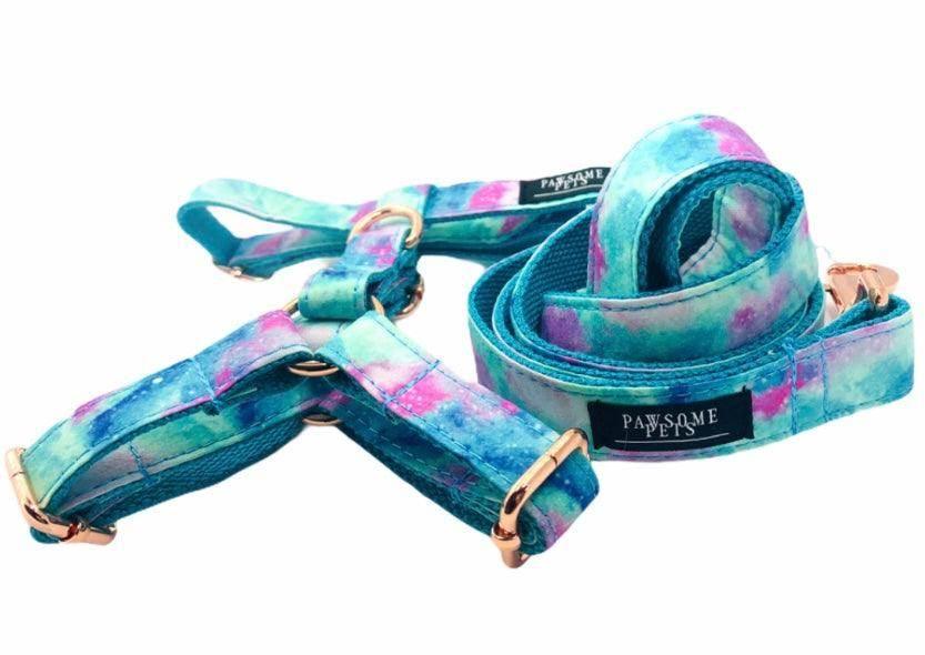 Tie-dye dog harness and leash set with rose gold hardware, perfect for pet walks and outdoor adventures.