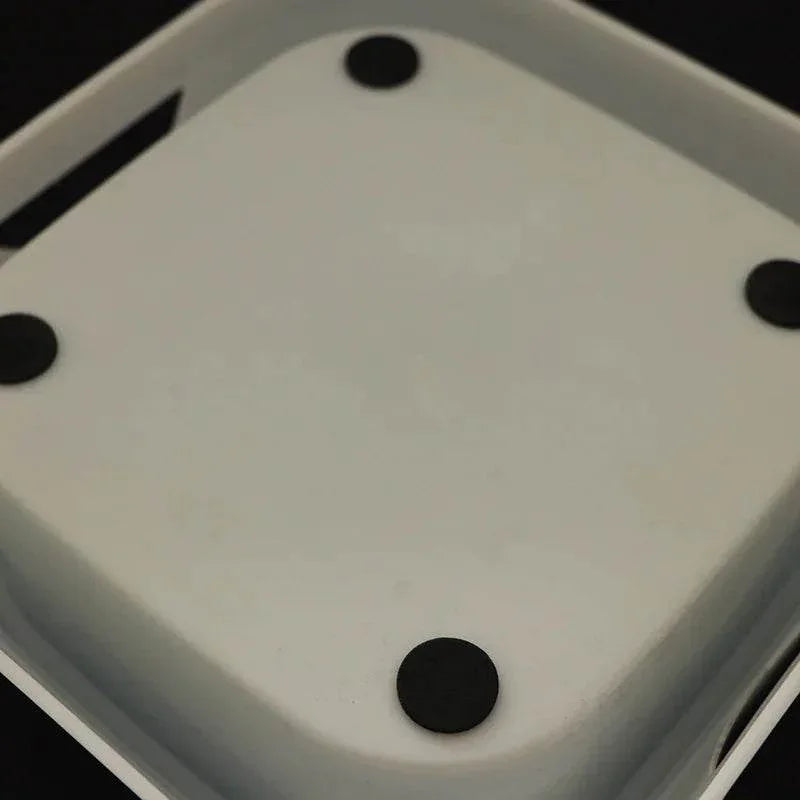 White pet accessory base with black non-slip pads, ideal for dog or cat supplies