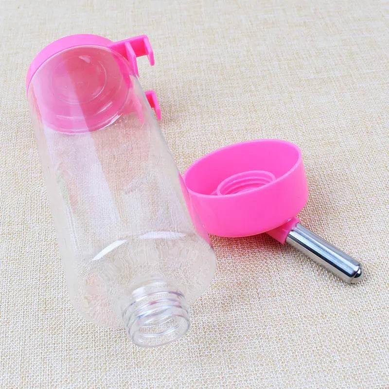 Pink pet water bottle with metal spout for dogs and cats