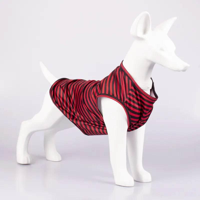 Red and black striped dog vest on white mannequin, pet clothing for small dogs