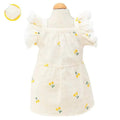 White pet dress with yellow floral print, ruffled sleeves, and soft cotton lining for dogs or cats