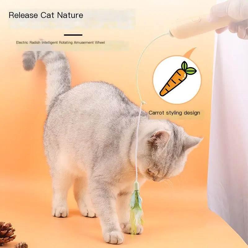 Gray cat playing with carrot-shaped feather toy, electric rotating pet amusement wheel for indoor fun