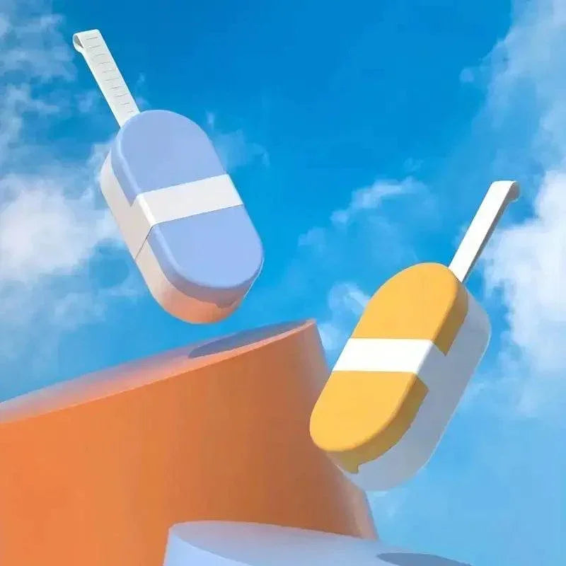Colorful popsicle-style pet toys floating against blue sky, ideal for dog and cat playtime fun