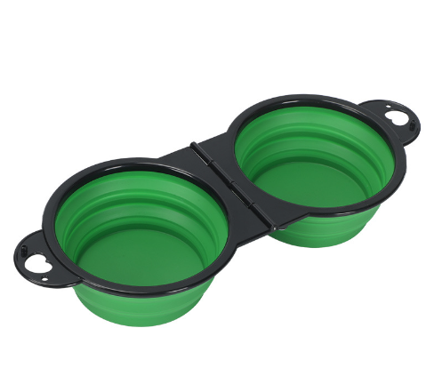 Green collapsible dual pet bowl for dogs and cats, portable travel feeder with black frame