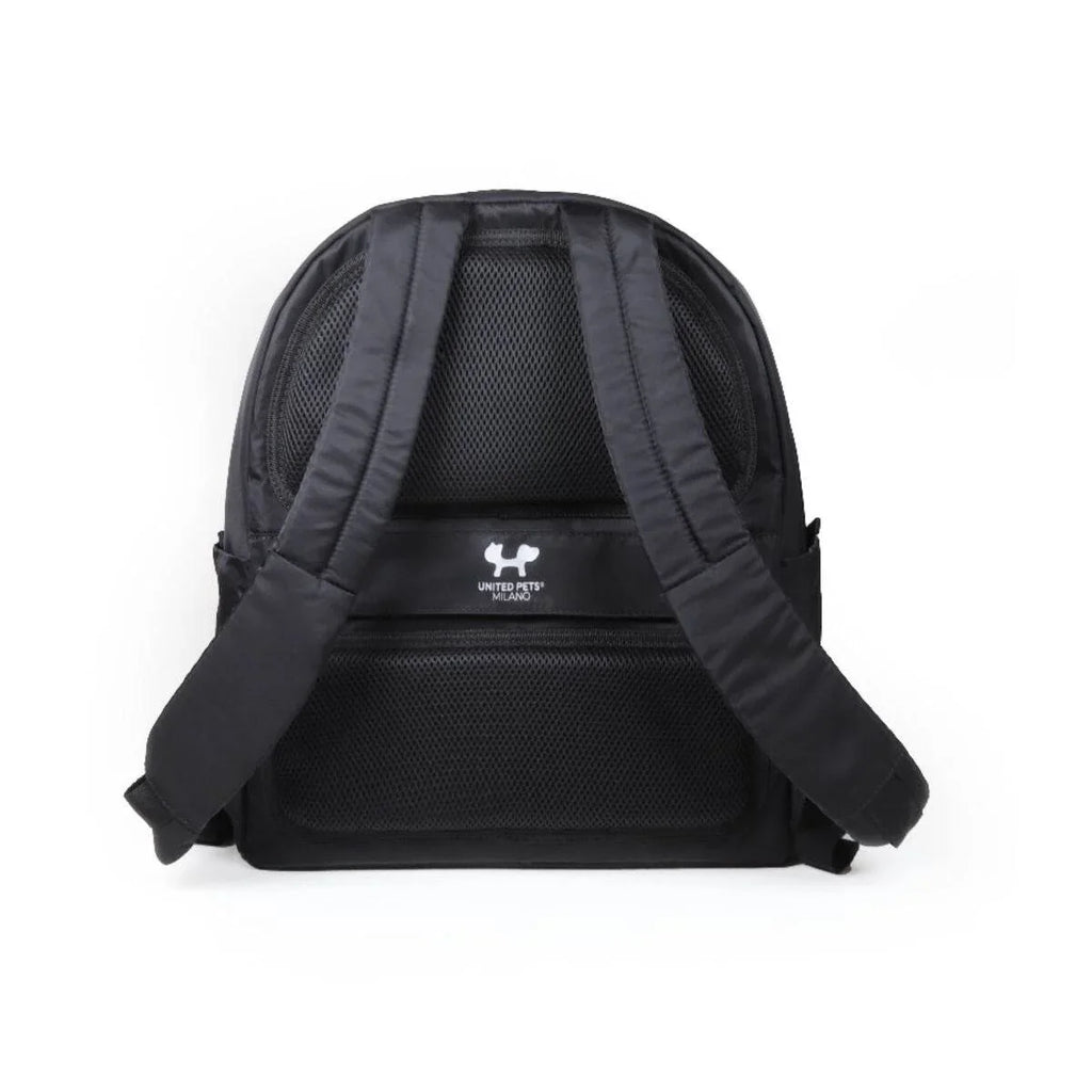 Black pet carrier backpack with mesh back panel and padded straps, United Pets Milano logo visible