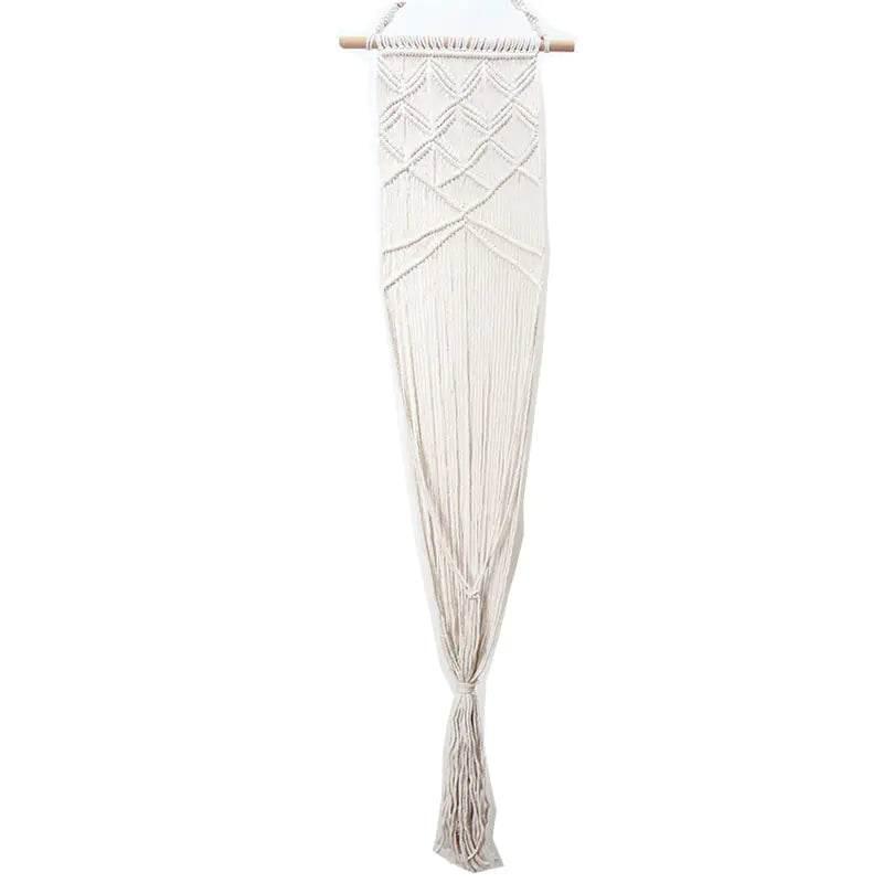 Boho macrame wall hanging with geometric pattern and tassel, natural fiber decor for pet-friendly homes