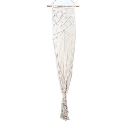 Boho macrame wall hanging with geometric pattern and tassel, natural fiber decor for pet-friendly homes