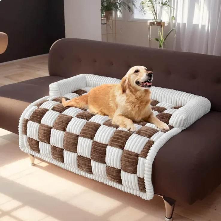 Golden retriever resting on checkered dog sofa bed, cozy pet furniture for living room comfort