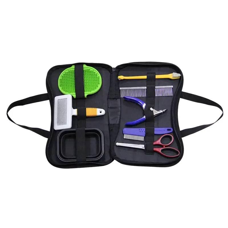 Portable pet grooming kit with brushes, combs, clippers, and scissors for dog and cat care