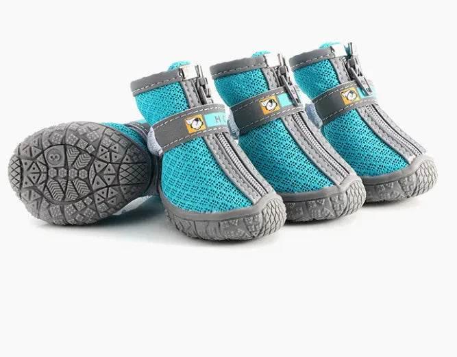 Blue and gray dog boots with zippers and non-slip soles for pet paw protection