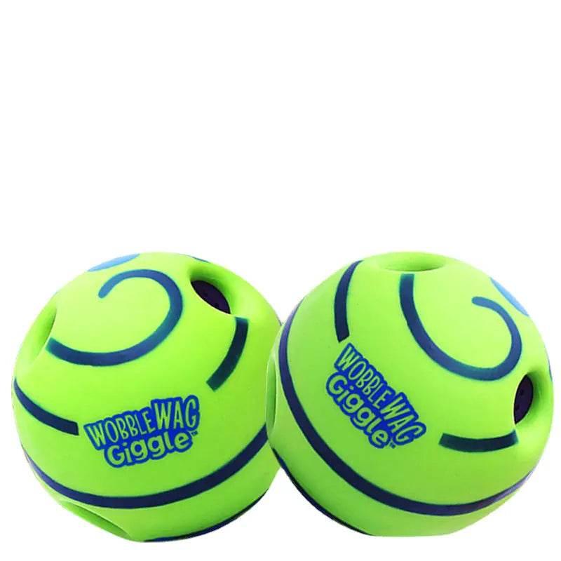 Bright green Wobble Wag Giggle dog toys with blue swirls and holes for interactive play