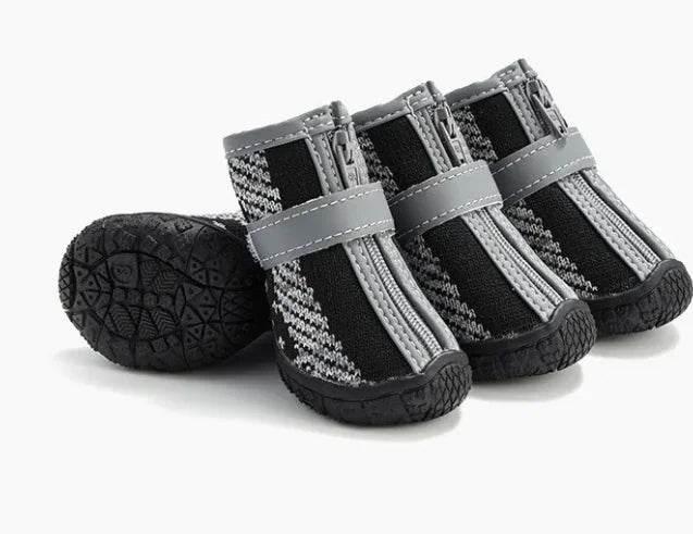 Black and gray dog boots with zipper and non-slip soles for pet paw protection