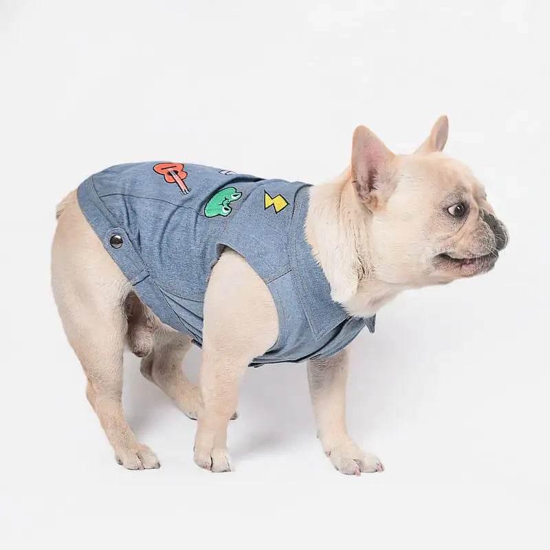 French bulldog wearing denim vest with colorful patches, pet clothing for dogs