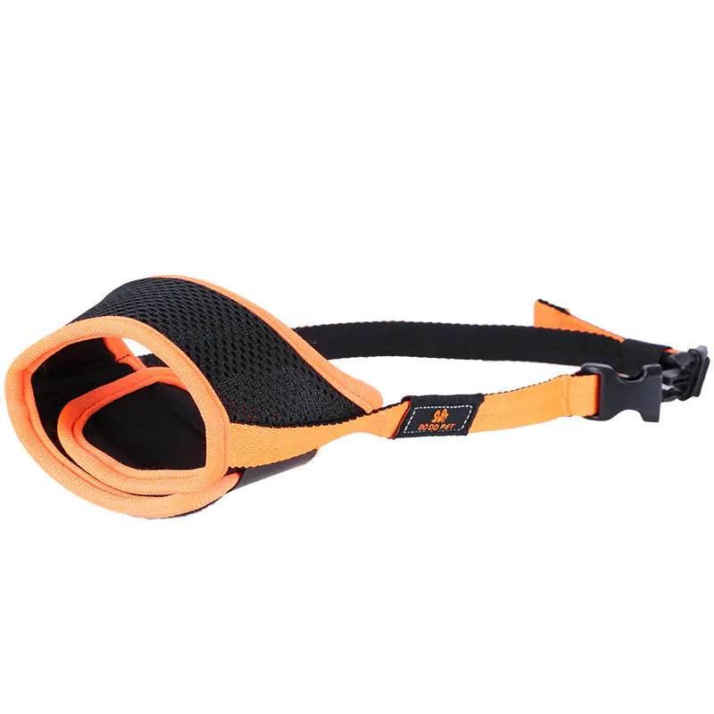 Orange and black dog muzzle with adjustable strap and breathable mesh for pet safety and comfort