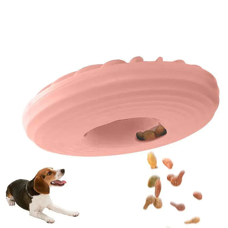 Pink slow feeder dog bowl with kibble dispensing, ideal for pet care and mealtime enrichment