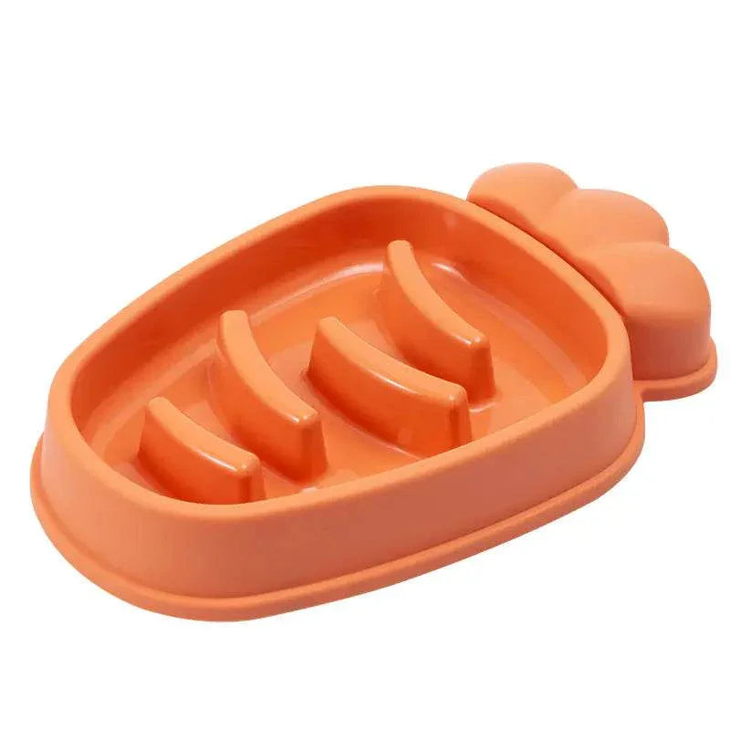 Orange carrot-shaped slow feeder bowl for dogs and cats, promoting healthy eating with ridges.