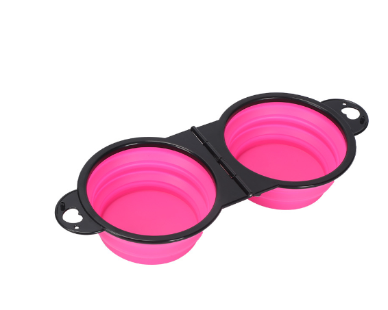 Pink collapsible pet bowl with black frame, ideal for travel with dogs or cats