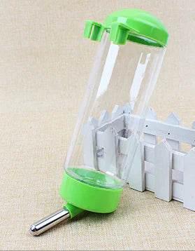 Green and clear pet water bottle with metal spout for small animals, ideal for hamsters or rabbits