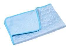 Soft blue pet grooming towel with textured design for gentle drying