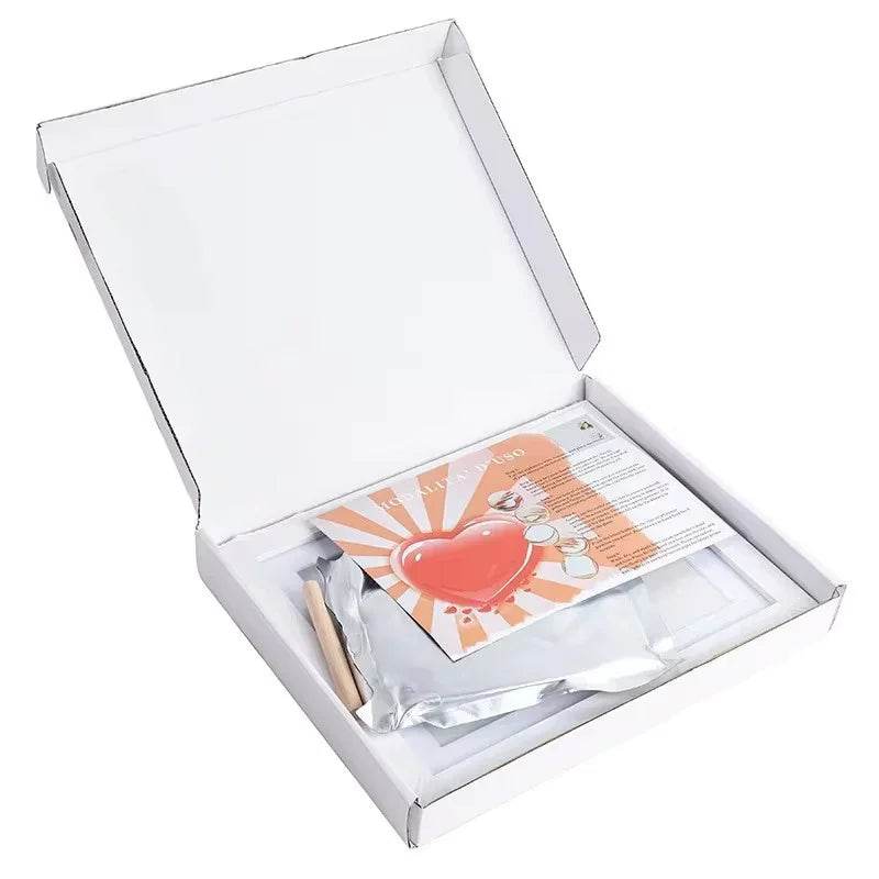Pet memorial kit with heart design, keepsake items, and instructions in white box for dog or cat loss