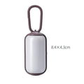Compact pet waste bag dispenser with carabiner clip, 8.4x4.3cm, for dogs and cats