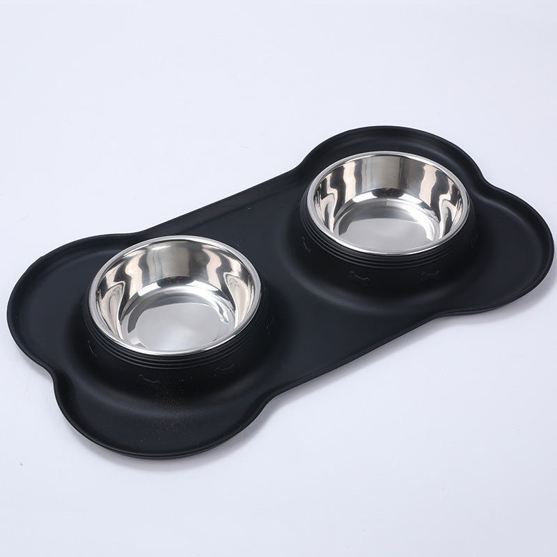Black silicone pet feeder with two stainless steel bowls for dog or cat food and water