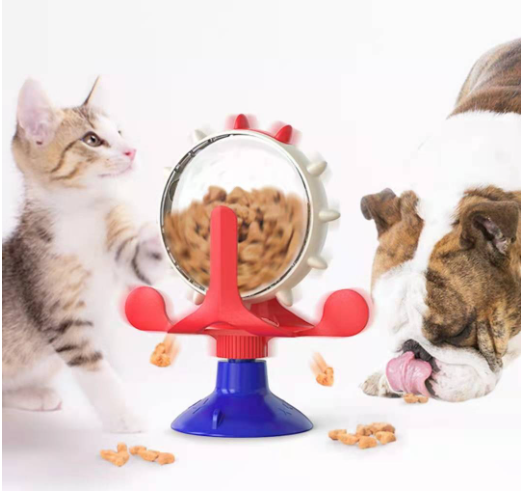 Interactive pet food puzzle toy for dogs and cats with spinning wheel and scattered kibble