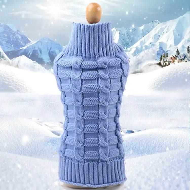 Cozy blue knit dog sweater with cable pattern, perfect for winter pet warmth and comfort
