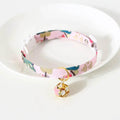 Pink floral cat collar with gold bell charm, pet accessory for cats