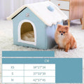 Cozy blue pet house with white fluffy roof, shown with small dog, ideal for indoor dog beds and pet comfort.